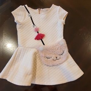 pink baby Sara dress with kitten pocket